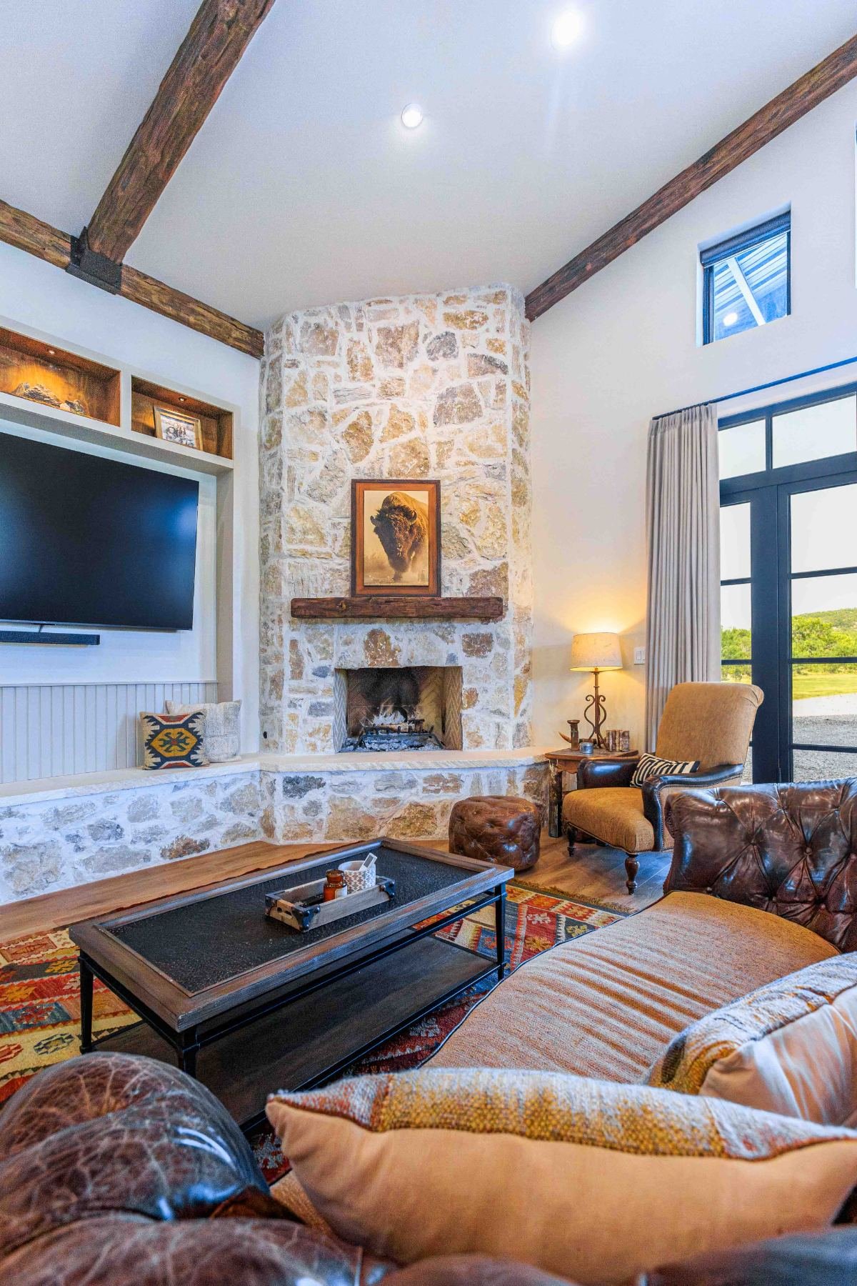Living room with stone fireplace