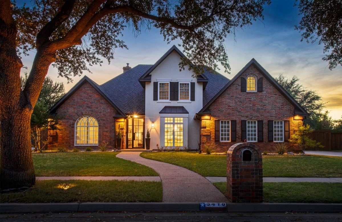 Twilight exterior, brick two-story